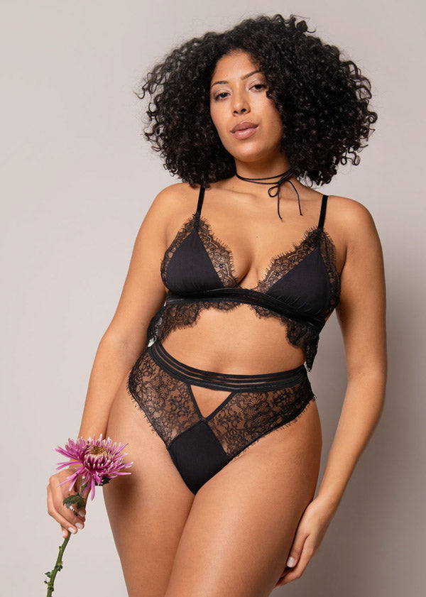 curvy woman looks confident and beautiful in lace underwear