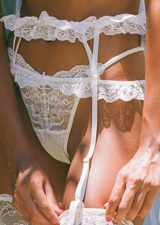 detail of the wedding garter belt and thong that make the perfect bridal lingerie